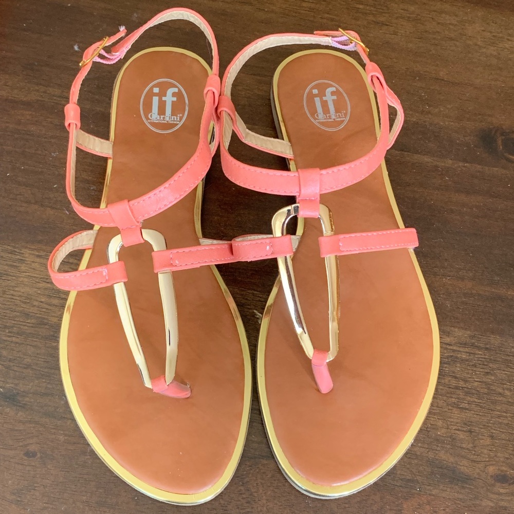 Coral and gold medal accent flat sandals